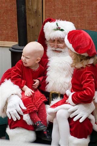 Uh-oh- I don't think Olivia is a fan of Santa yet...